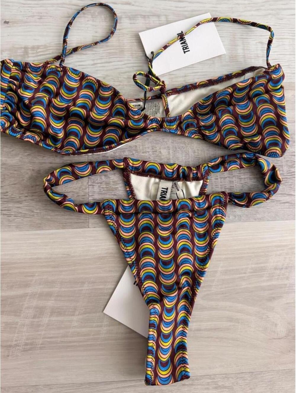 Triangl bikini set with blue, yellow, and brown concentric circles